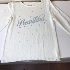 white long sleeved sweater